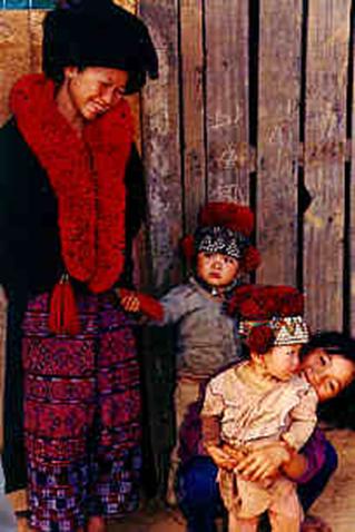 Yao Woman with Children, Yao Village in Chiang Rai Province.