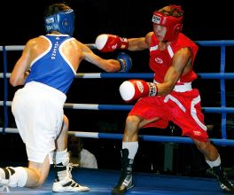 Eventual Bronze medal winner John Joe Joyce goes on the attack against Dimitri Popov in their first round bout. 