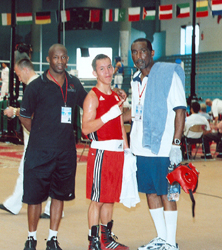 Coach Nicholson, Luis Yanez and Coach Campbell at the bouts